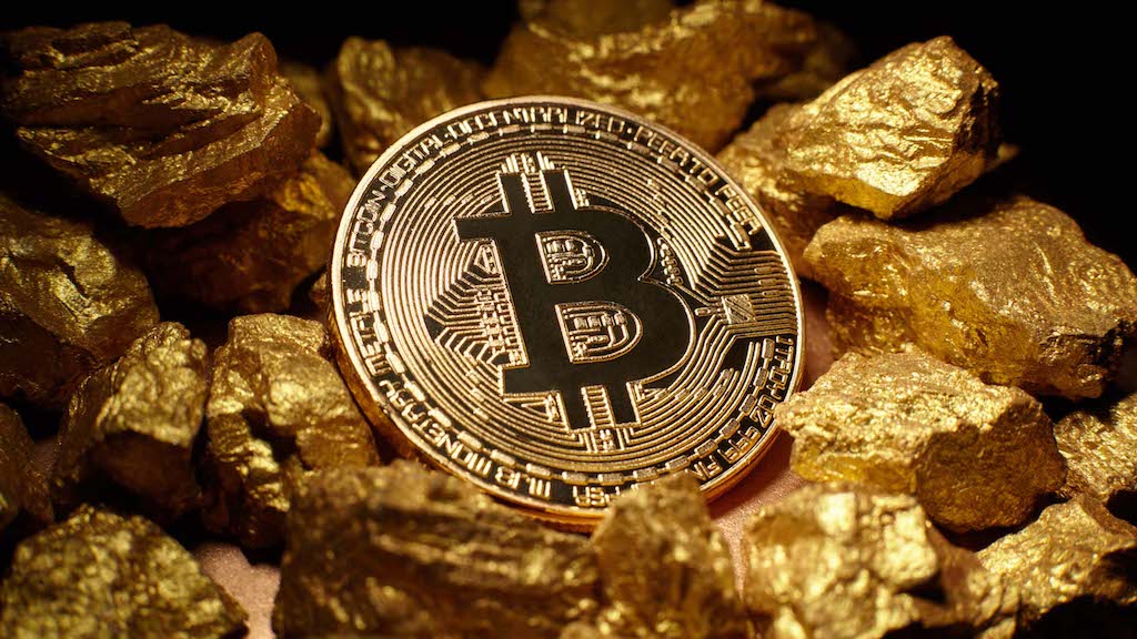 Глава Мосбиржи: криптовалюта напоминает золото. Фото.