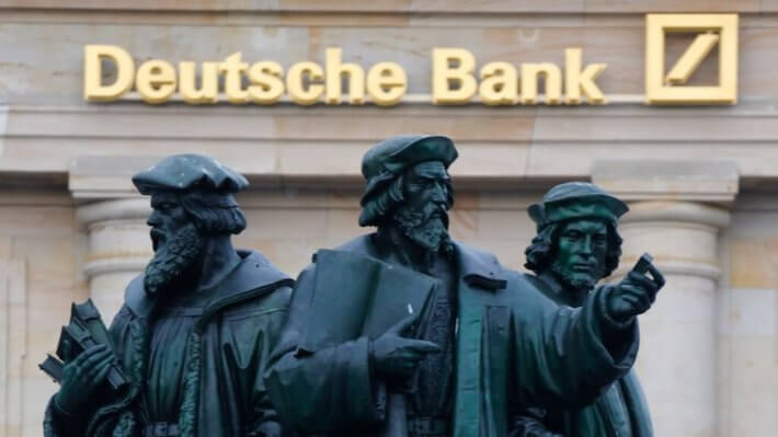 Deutsche Bank предупредил владельцев криптовалют о рисках стать банкротом. Фото.