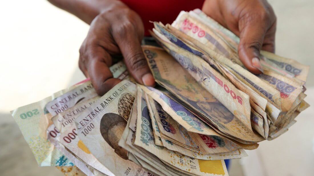 Граждане Нигерии игнорируют запреты властей и продолжают пользоваться криптовалютами. Фото.