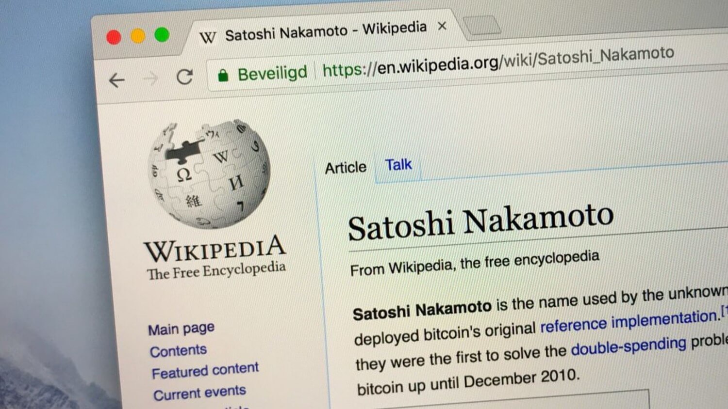 Победа над криптовалютами. Страница Википедии. Фото.
