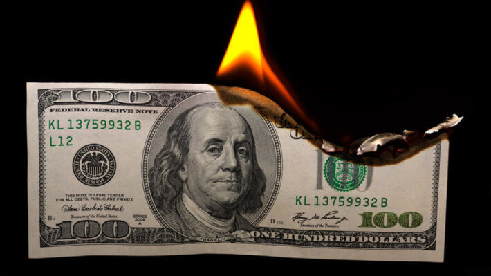 доллар горит банкнота