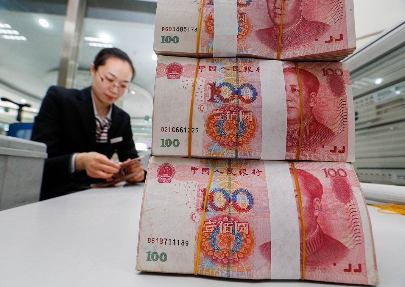 Китай пытается обвалить Биткоин. Китайский юань. Фото.