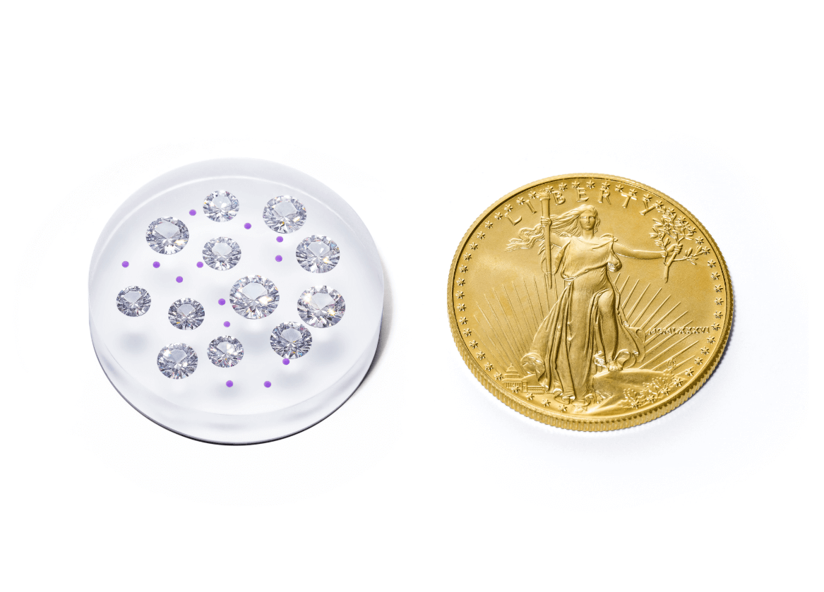 Как устроен Diamond Standard? Внешний вид физической монеты с запечатанными бриллиантами. Фото.