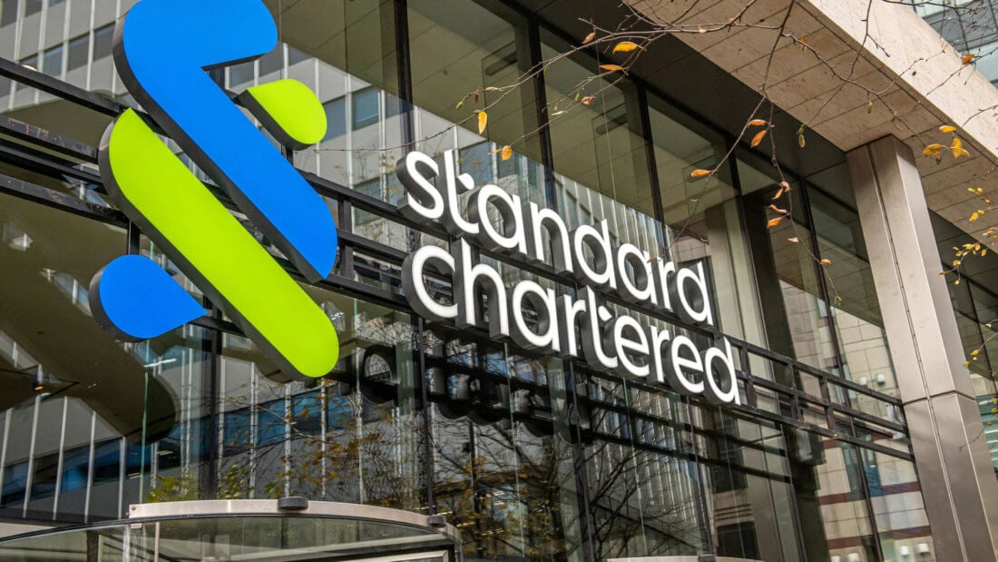 Банк Standard Chartered запустит собственную торговую платформу для криптовалют. Почему это важно? Фото.