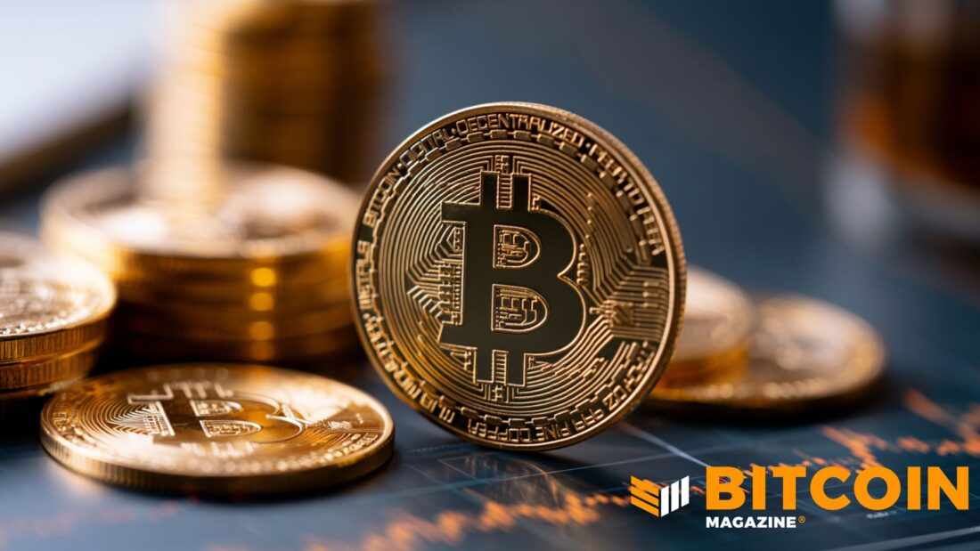 Hardware crypto wallet on dark desk with red warning glow, security breach concept