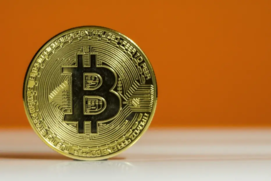 Bitcoin symbol chained to falling stock chart, dark editorial illustration